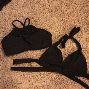 Two black bikini tops